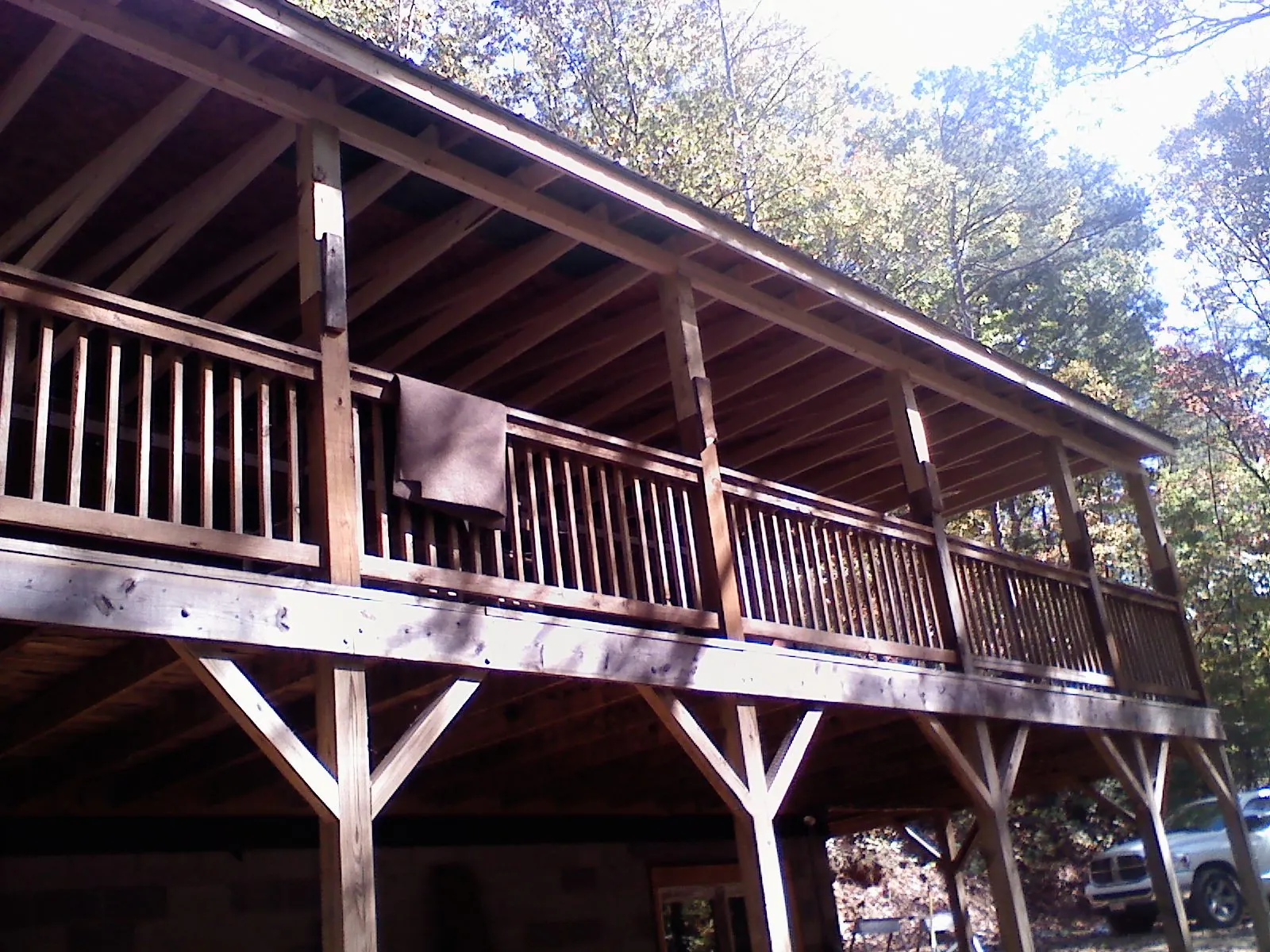 Timber framing under a new elevated porch and deck — Roof Leak Repair in Andrew by Roofing Brothers